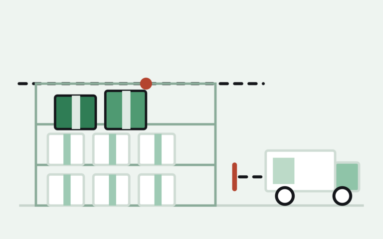 Warehouse shelf with boxes stacked above the Amazon FBA capacity limit line while a delivery truck is blocked from unloading