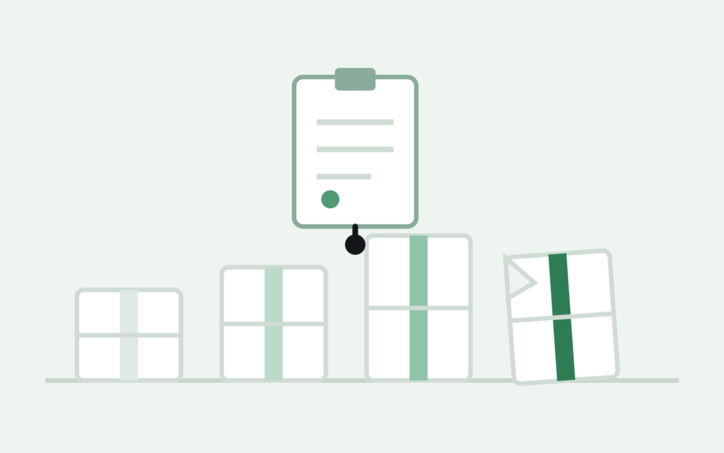 Row of inventory boxes graded from new to salvage showing liquidation condition grades